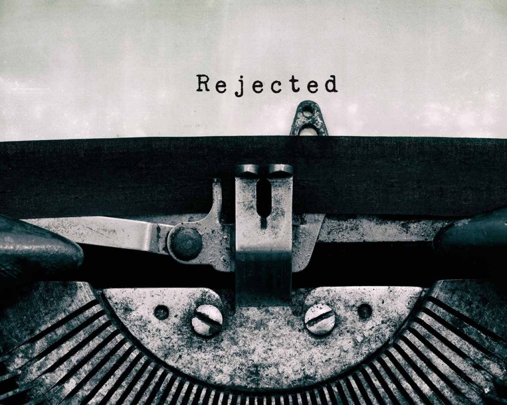 Old typewriter with the word rejected typed on it